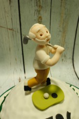 figuras modeladas a mano de fondant, figura golf, tartas personalizadas madrid, tratas fondant madrid. tartas decoradas madrid